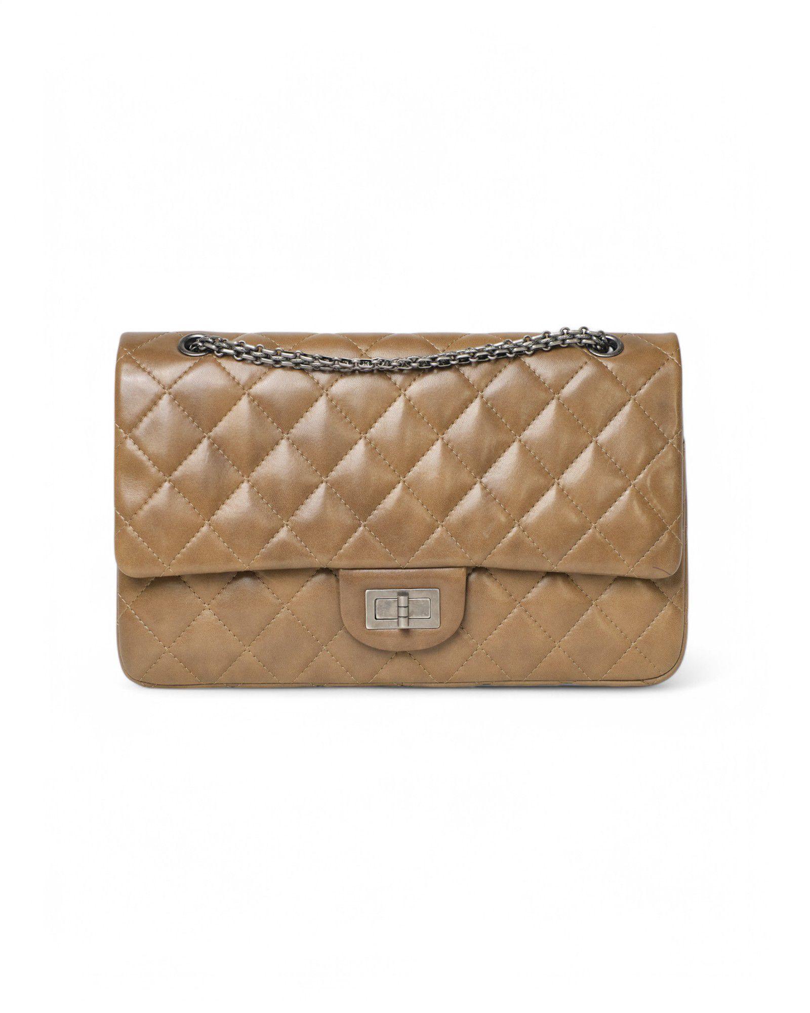 Chanel signature bag, model Maxi Jumbo, made of fine quilted leather in green color with silver hardware. This model has a double button closure and an external swivel closure, internally lined in smooth tone-on-tone leather with convenient pockets,