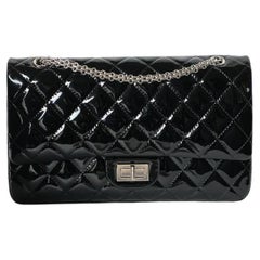 Chanel Maxi Jumbo Reissue Double-Flap Black Paint