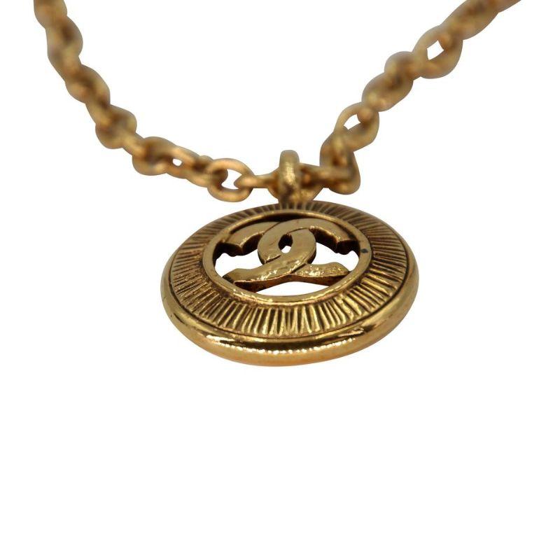 Chanel Medallion CC Large Gold 18k Plated Necklace CC-0924P-0010

Limited Edition Chanel Medallion 18K Gold Plated CC logo necklace is a true collectors' masterpiece find. This stylish necklace features a large Chanel CC and pendant with a textured