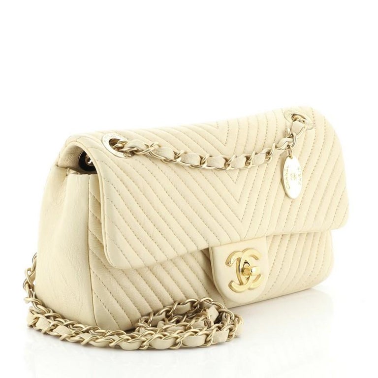 Chanel Silver Chevron Pearl Lambskin Rectangular Mini Flap Bag SHW – Boutique  Patina