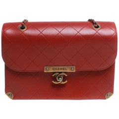 Chanel medium boy bag, dark red leather with gold hardware