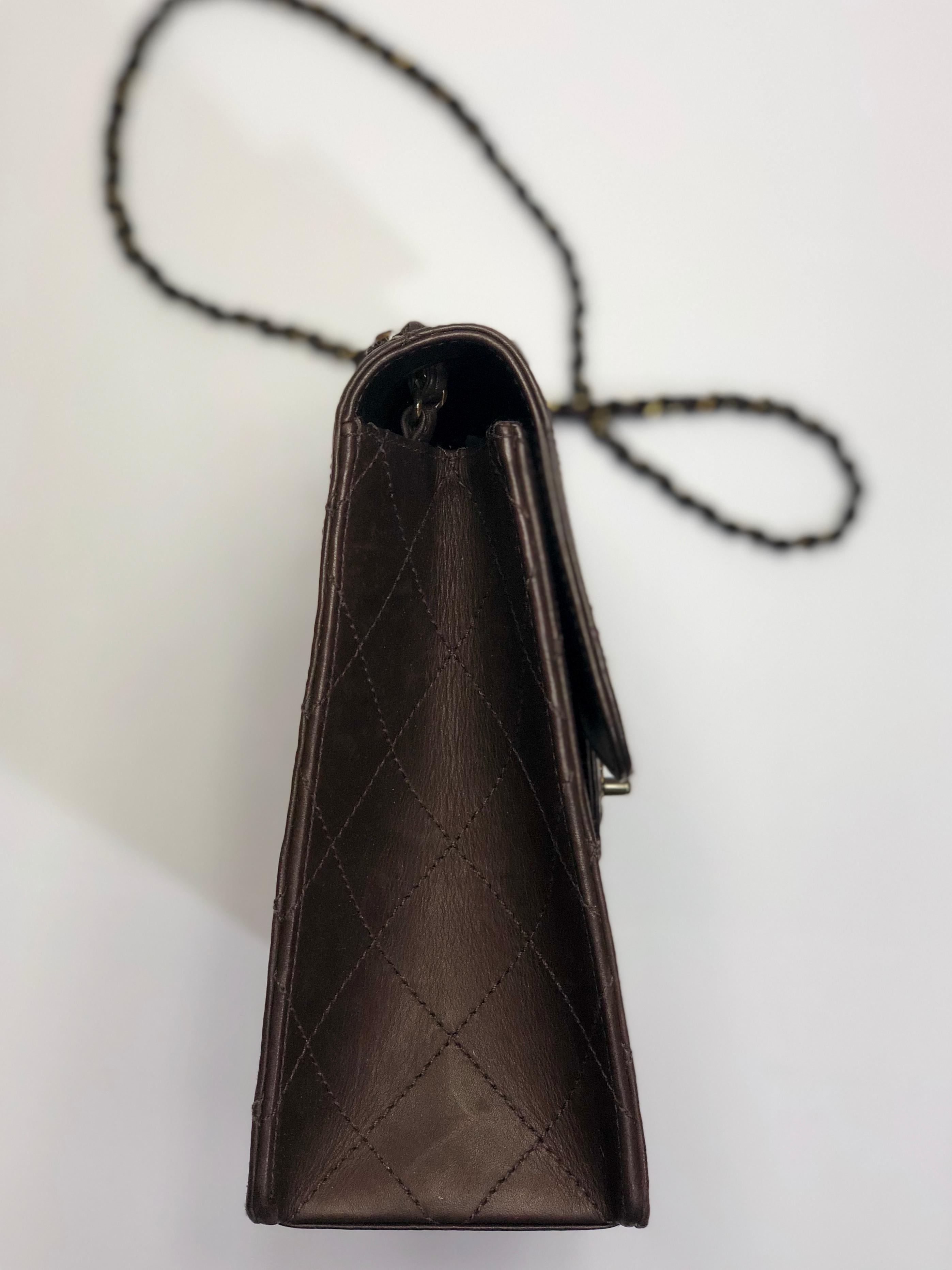 Chanel Chocolate Brown, Lambskin, Medium Classic Single Flap Shoulder Bag w/ Chainlink Strap & Twist-Lock Closure.