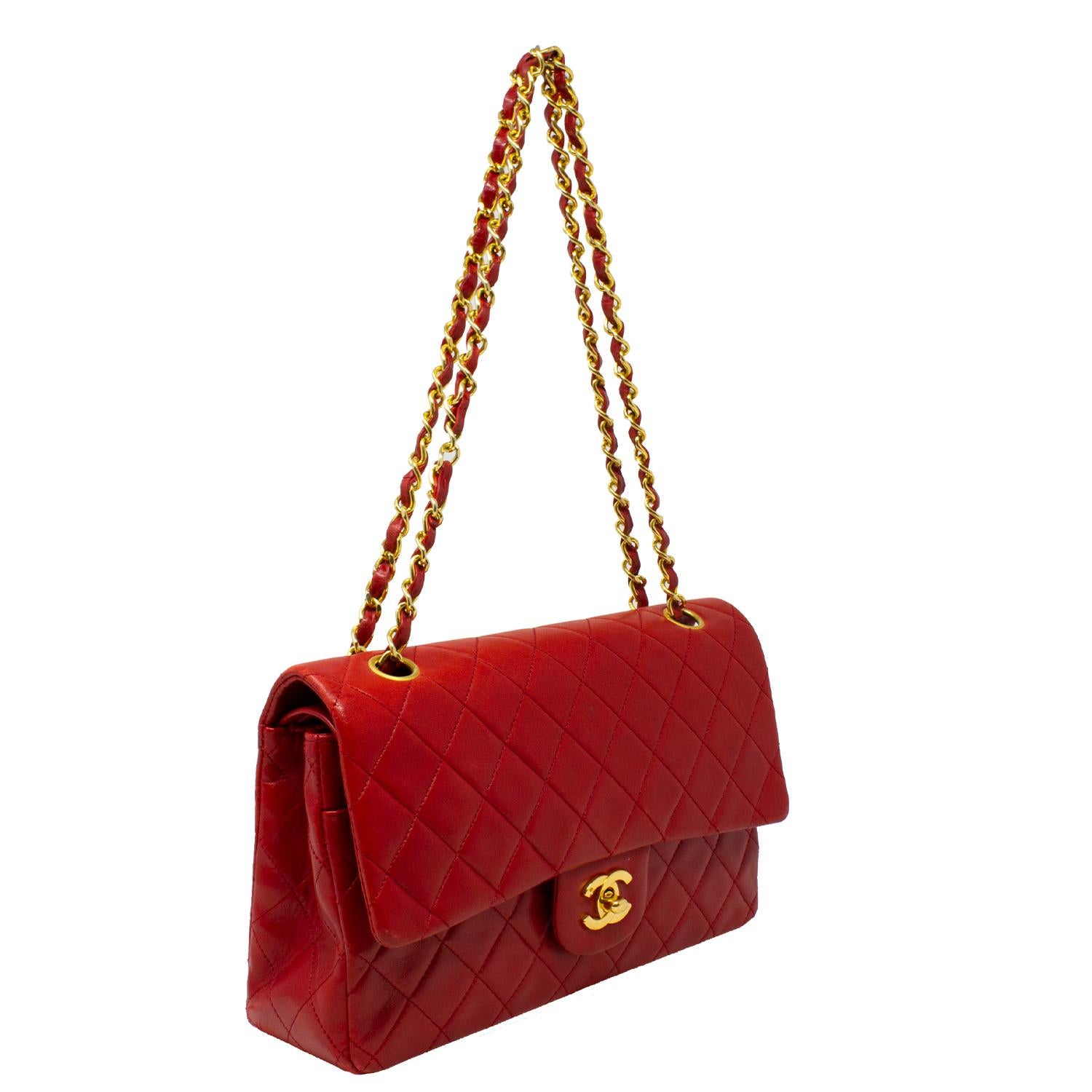 If you are going to get a classic Chanel for your collection, THIS is the one to get as it’s the original double flap bag from the early 90s (Karl Lagerfeld's genius!) with the 24k gold hardware and the red color is so rich and stunning! This red