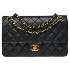 Chanel Medium Timeless double flap shoulder bag in black quilted lambskin,GHW
