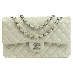 CHANEL, Medium Timeless in white leather