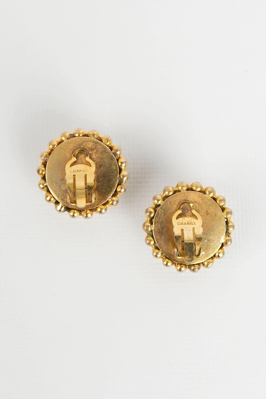 Artist Chanel  Metal Clip Earrings Centered with a Pearly Cabochon For Sale