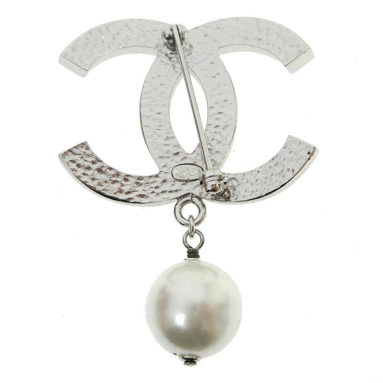 Chanel Metal Silver CC Charm Pearl Chain Pin Lapel Brooch at 1stDibs