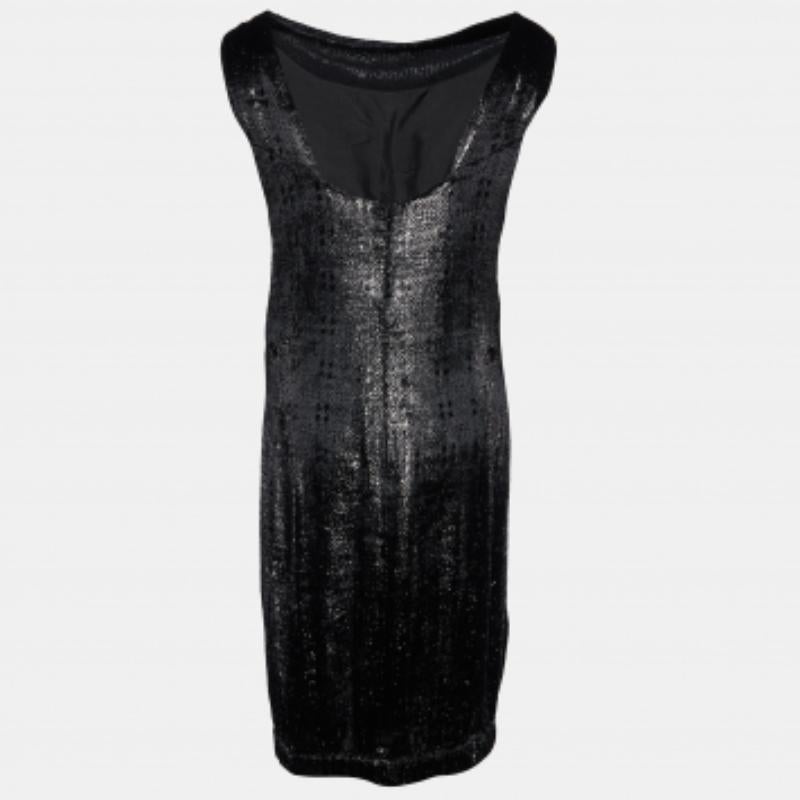 Découvrez les joies d'une confection experte avec cette robe de créateur pour femme. Méticuleusement confectionné, il offre une coupe impeccable et des détails luxueux, garantissant un confort inégalé. Son design classique lui permet de s'adapter à