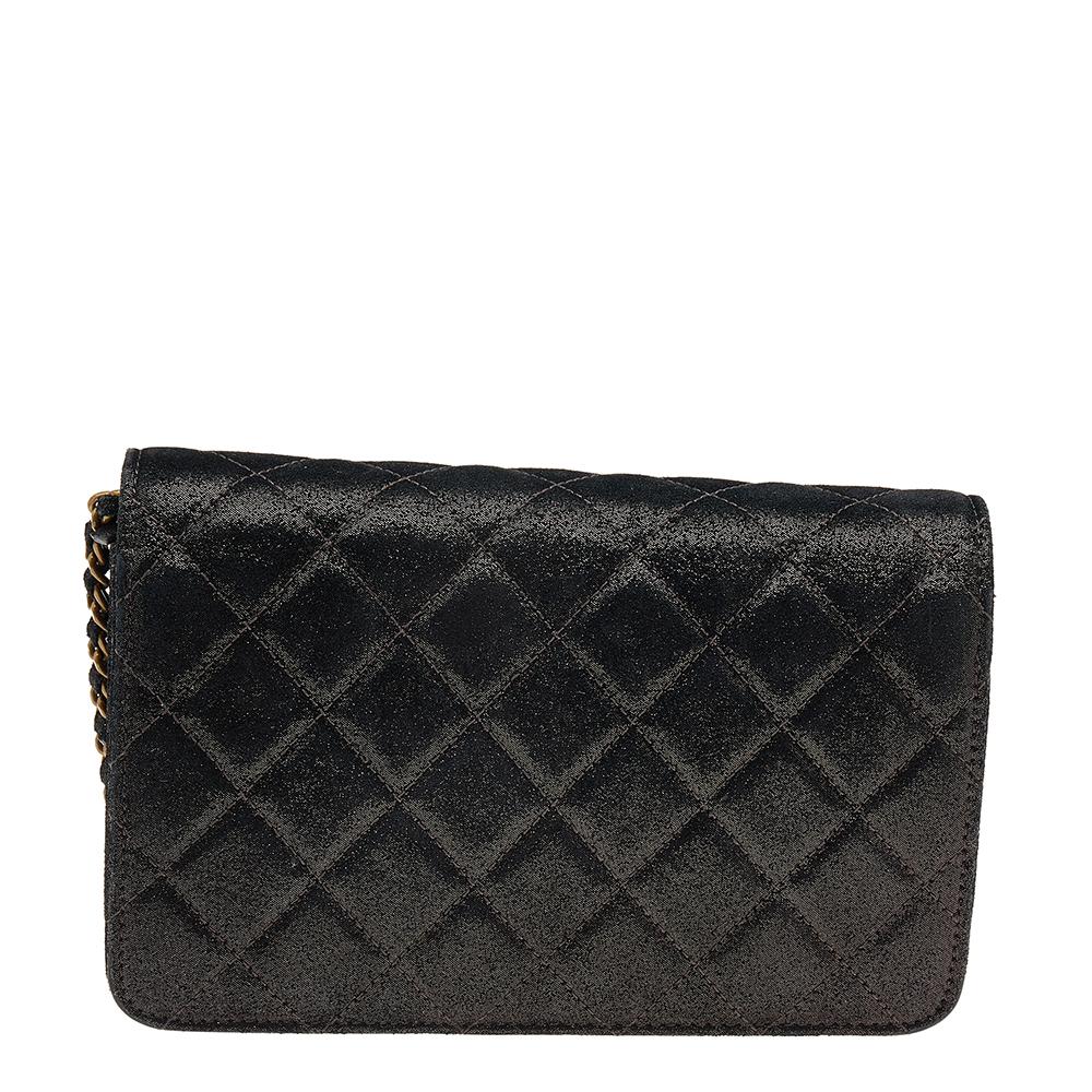 Get the assurance of quality and style that never fades with this Chanel Wallet On Chain. It is sewn using iridescent canvas and the interior has a wallet-like layout with space for cards, cash, and coins. The Chanel WOC is complete with a shoulder