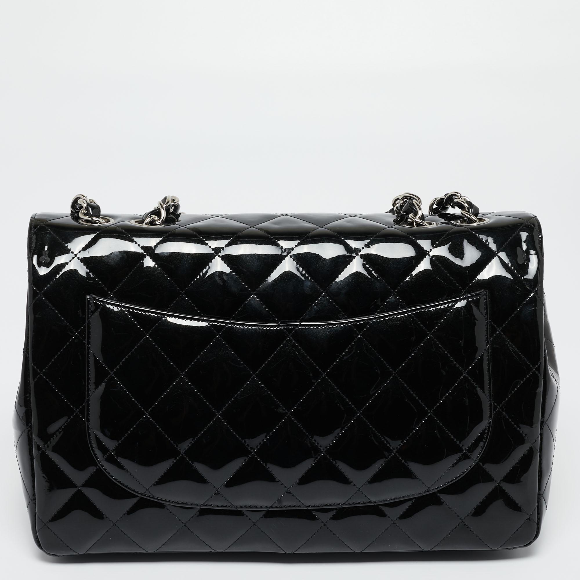 We're bringing Chanel's iconic Classic Flap bag to your closet with this creation. Exquisitely crafted from quilted patent leather, it bears the signature label inside the leather interior and the iconic CC turn-lock on the flap. The black Chanel