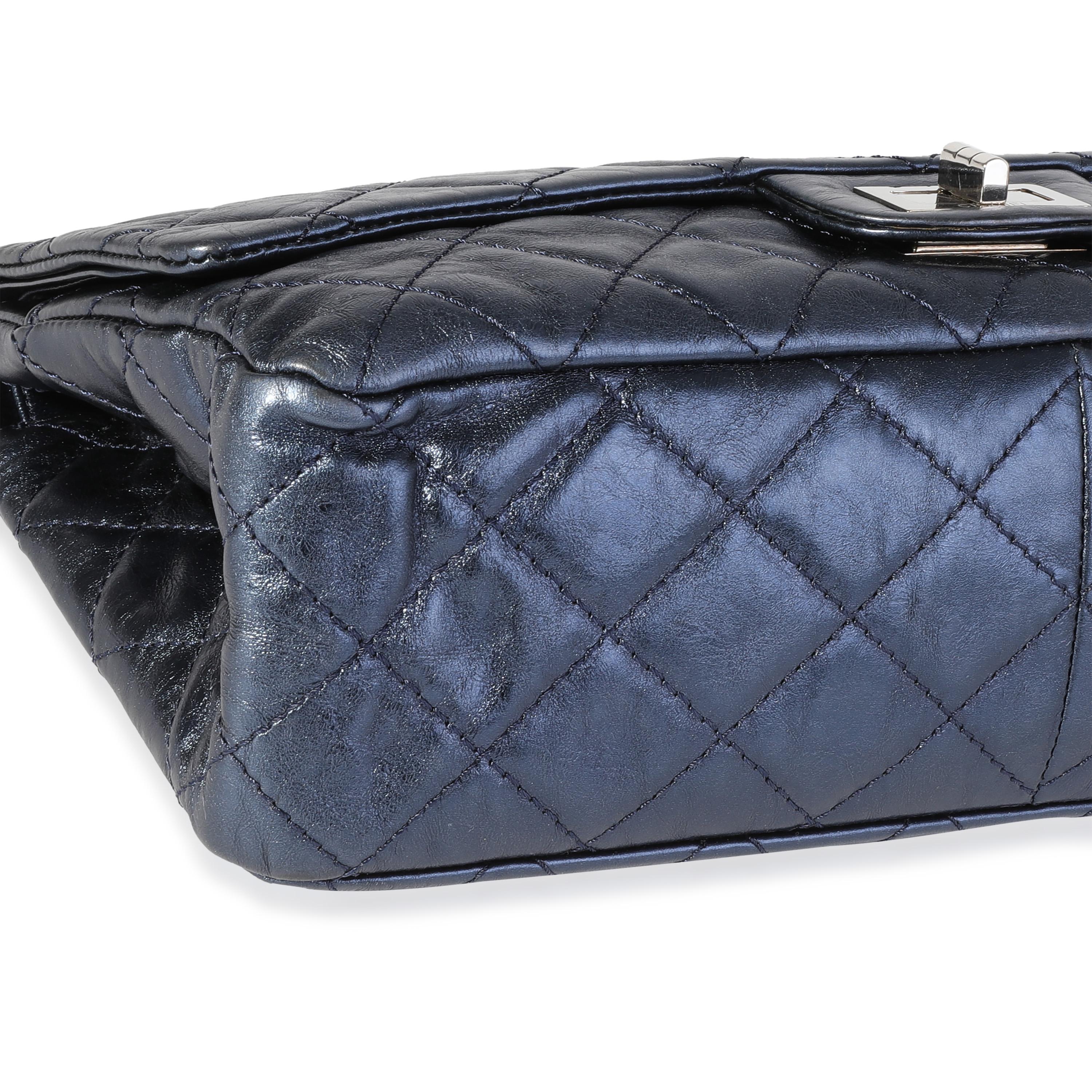 Listing Title: Chanel Metallic Blue Quilted Aged Calfskin Reissue 2.55 227 Double Flap Bag
SKU: 116034
Condition: Pre-owned (3000)
Handbag Condition: Very Good
Condition Comments: Very Good Condition. Scuffing to corners and throughout exterior