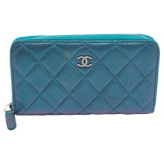 Used Chanel Metallic Blue Quilted Leather Classic Zip Wallet
