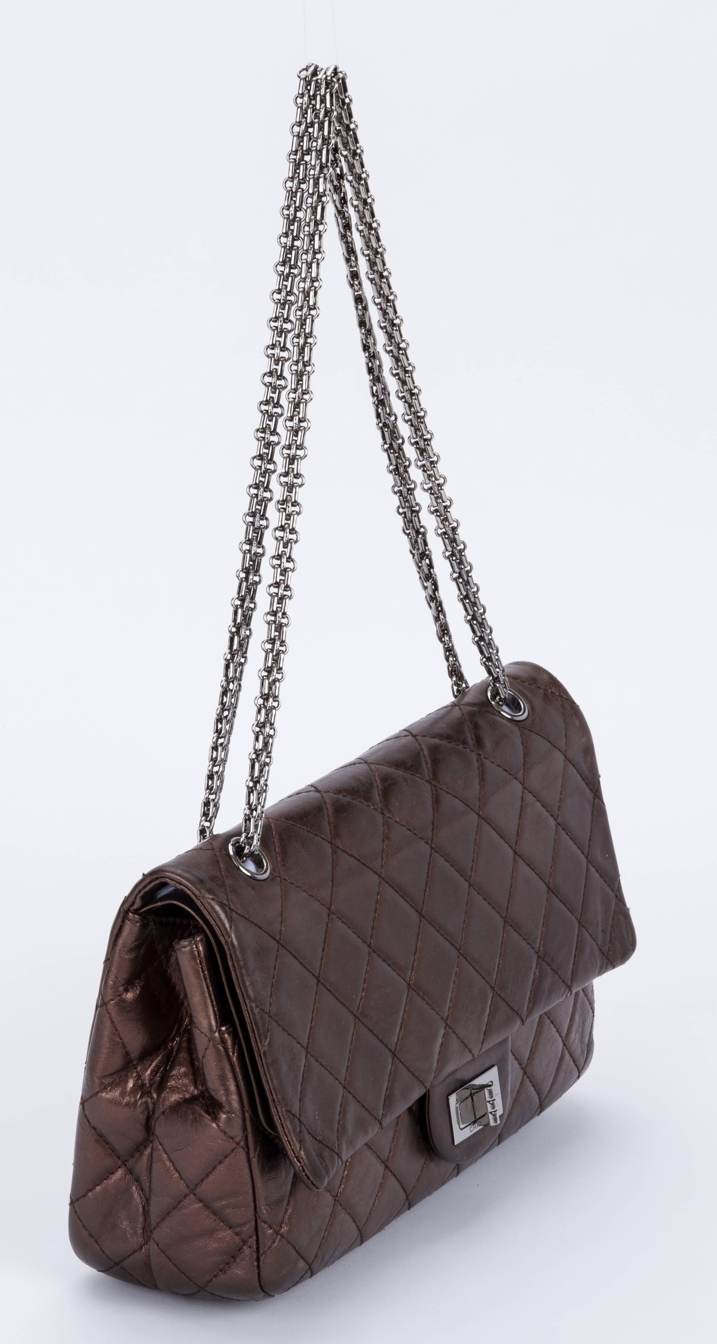 Chanel bronze metallic 2.55 reissue jumbo classic flap bag. Ruthenium hardware. Shoulder drop, 9.5