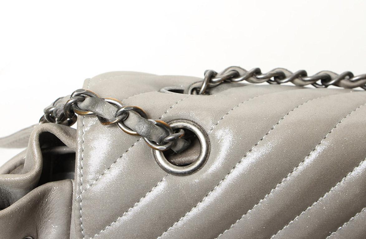 Chanel Metallic Chevron Calf Leather Drawstring Backpack In Excellent Condition In Thousand Oaks, CA
