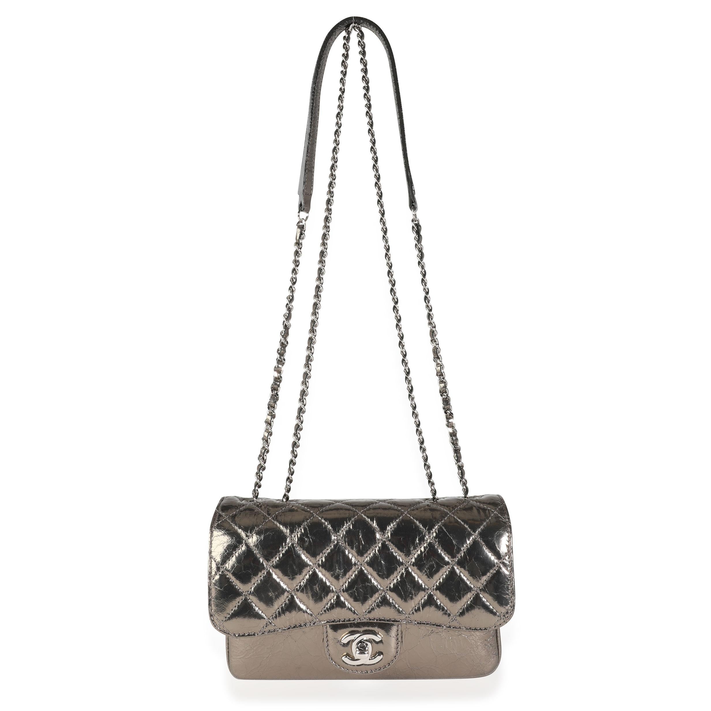 Listing Title: Chanel Metallic Cracked Leather Clams Pocket Accordion Flap Bag
SKU: 114421
Condition: Pre-owned (3000)
Handbag Condition: Excellent
Condition Comments: Excellent Condition. Faint discoloration to interior. No other visible signs of