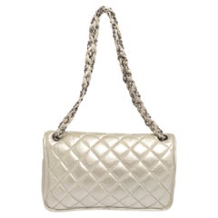 Chanel Metallic Cream Quilted Leather Logo Flap Bag