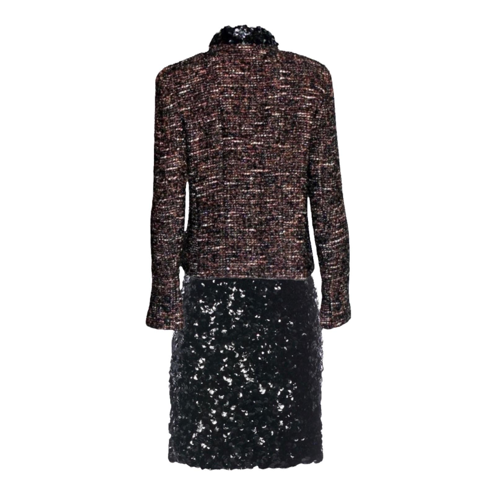 Beautiful CHANEL fantasy tweed jacket & skirt suit
A true CHANEL signature ensemble that will last you for many years
Jacket closes in front with concealed hooks
Slim, fitted style
Amazing metallic tweed fabric
Beautiful buttons on sleeves with real