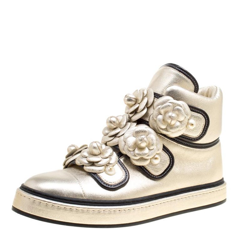 Chanel Metallic Gold Leather CC Camellia Flowers Embellished High Top  Sneakers S at 1stDibs | chanel stretch sneakers