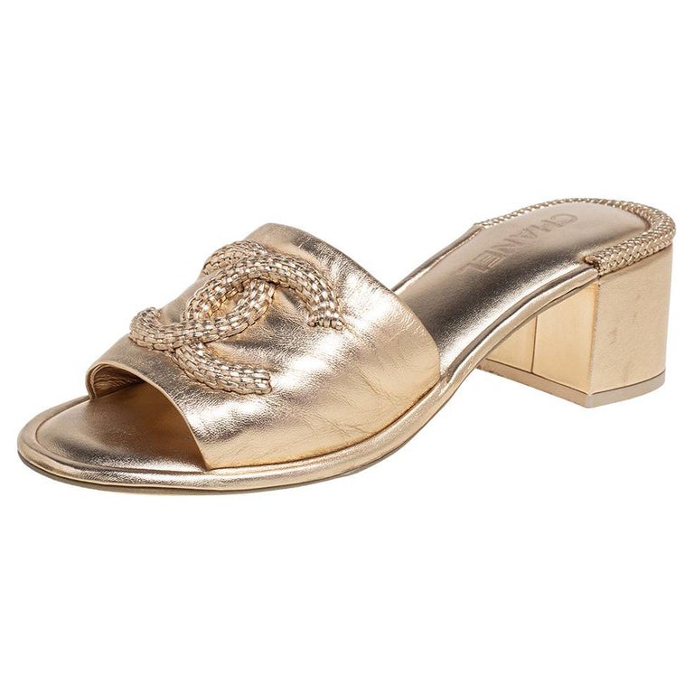 Chanel Metallic Gold Leather CC Logo Slide Sandals Size 40 at 1stDibs | chanel  gold slides, gold chanel slides, chanel gold sandals