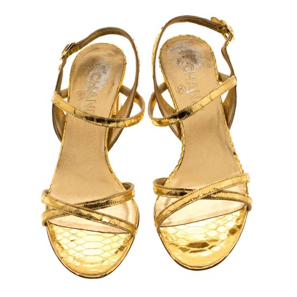 Chanel brings about a trendy twist to a classic silhouette with this pair of slingback sandals. Designed using gold tone leather, these strappy sandals are perfect for making a style statement every where they are flaunted.

Includes: Original Box

