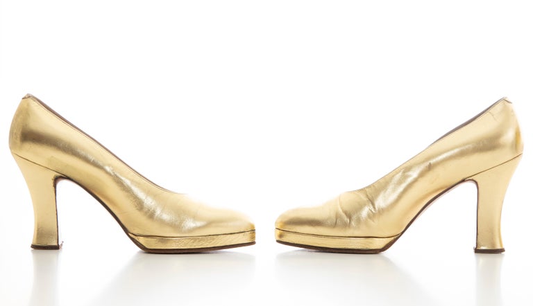 gold leather pumps