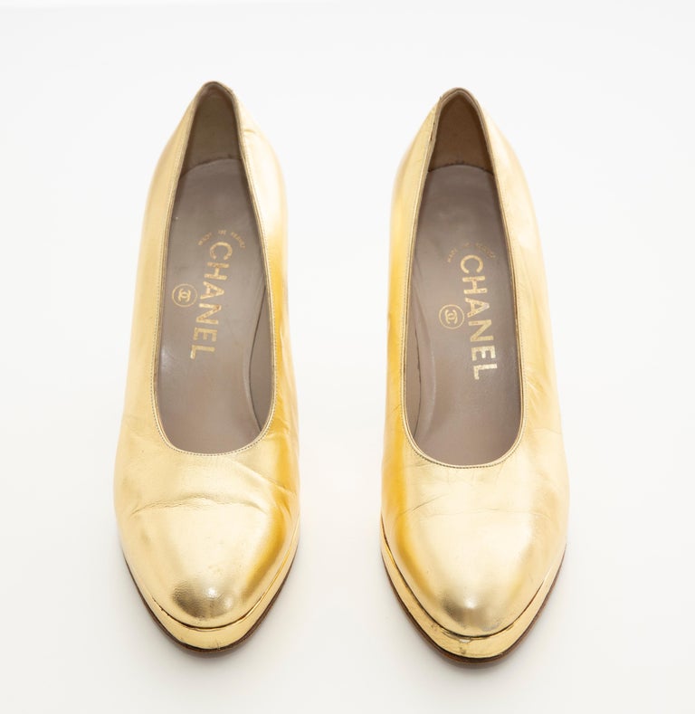 gold leather pumps