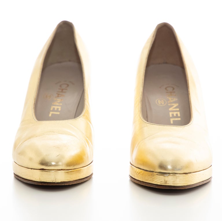 gold leather pumps
