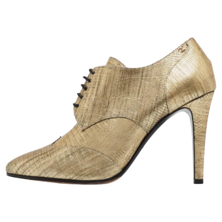 Chanel Botas doradas de lagarto metálico con logotipo CC entrelazado en relieve Talla 39 en venta