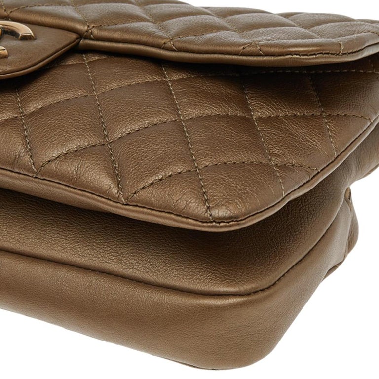 Chanel Metallic Gold Quilted Leather Zip Back Pocket Flap Bag at 1stDibs