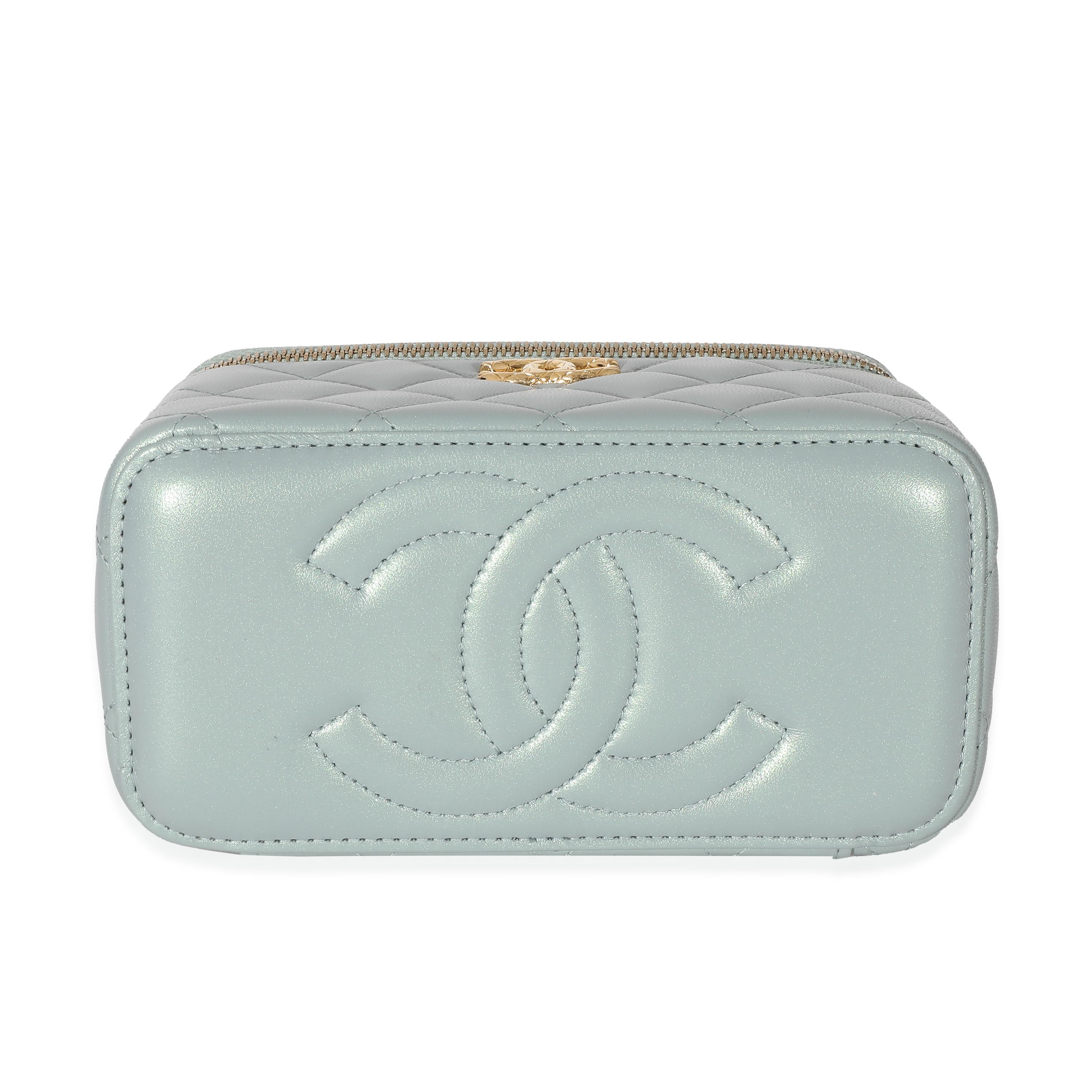 Listing Title: Chanel Metallic Green Lambskin Quilted Small CC Dynasty Vanity Case With Chain
SKU: 134034
Condition: Pre-owned 
Handbag Condition: Excellent
Condition Comments: Item is in excellent condition and displays light signs of wear.