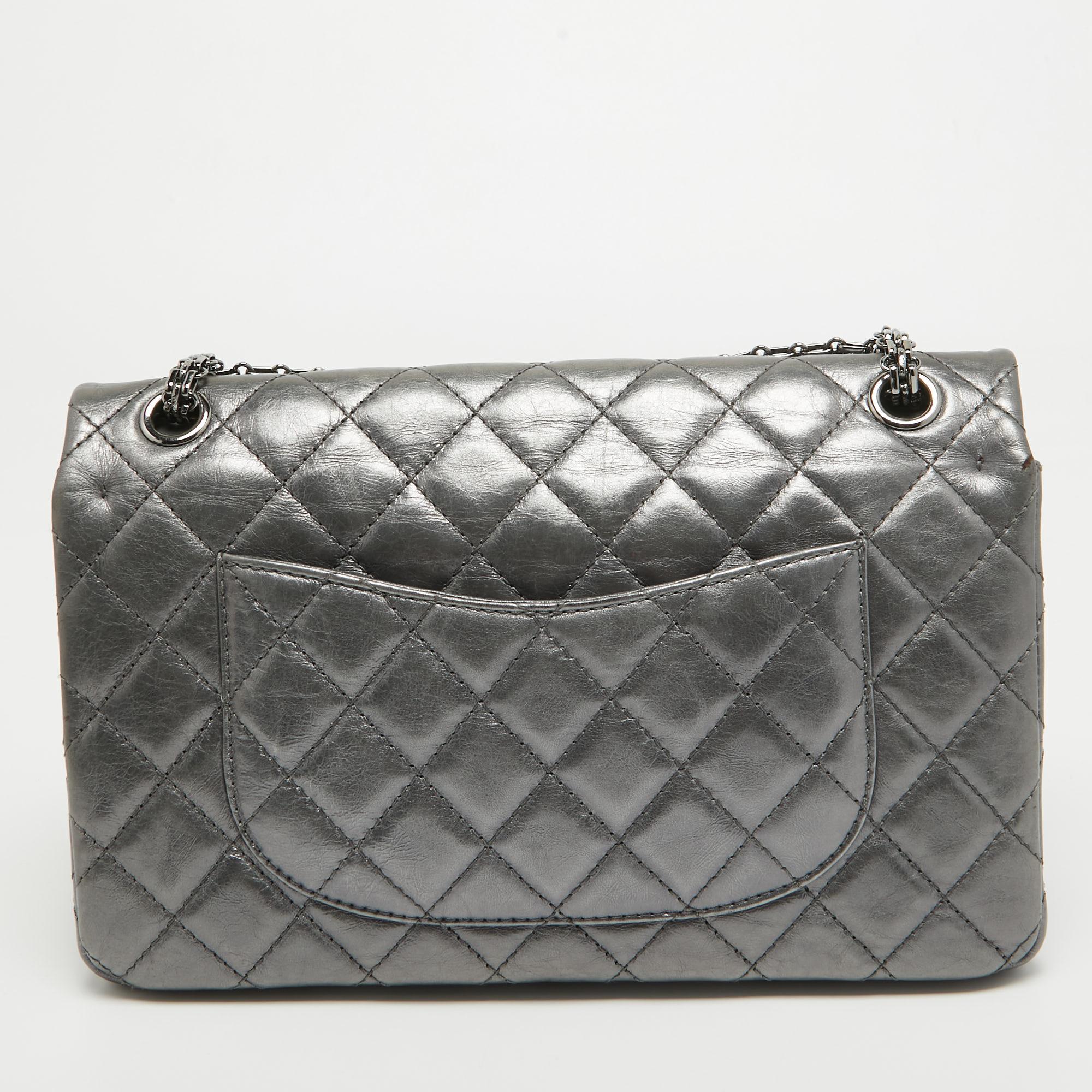 The house of Chanel offers this beautiful 226 Reissue 2.55 Flap bag to help you create timeless style edits every season. Crafted using quilted leather, this piece will last you a long time.

