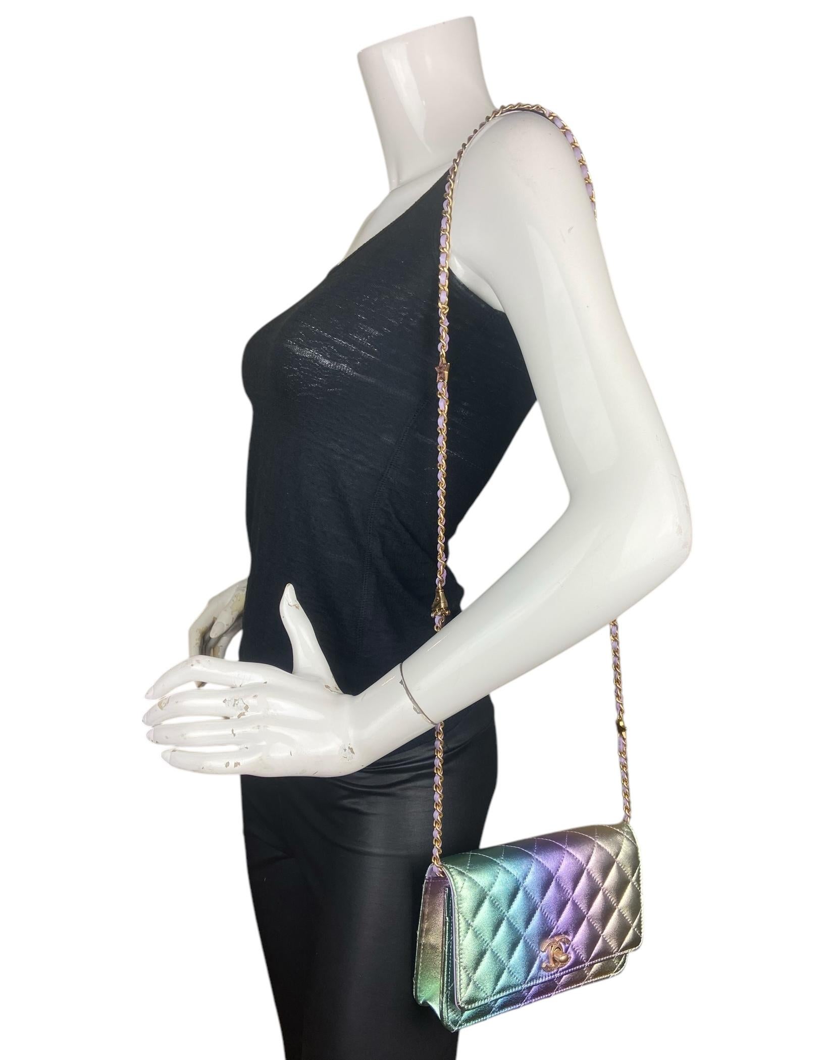 Chanel Metallic Ombre Leather Wallet On Chain WOC Crossbody Bag. Chain can be tucked inside bag to also be worn as a clutch. 

Made In: Italy
Year of Production: 2024C
Color: Metallic ombre
Hardware: Goldtone
Materials: Leather
Lining: Purple