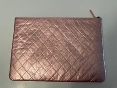 Chanel metallic pink clutch bag