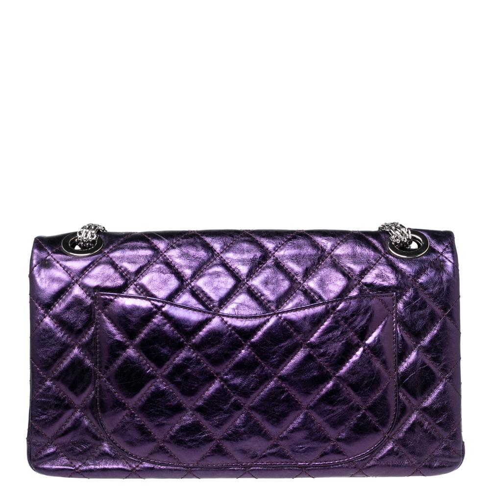 Introduce Chanel's irreplaceable style to your closet with this Reissue 2.55 Classic 228 Flap bag. Crafted using leather, the bag has a signature quilted exterior, the Mademoiselle lock on the front, and a leather-lined interior. Complete with a