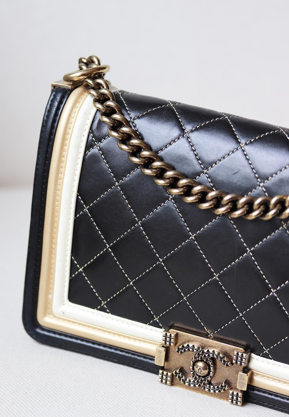 Chanel Metallic Quilted Lambskin Leather Boy Flap Bag has been hand-finished by skilled artisans in the label's workshop.
Boasting soft black, gold and ivory lambskin-leather exterior, this design is accented with gold-toned and black