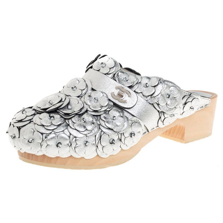 Chanel Metallic Silver Camellia Embellished CC Lock Wooden Clogs Size 39.5  at 1stDibs