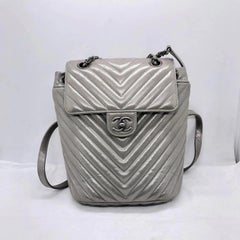 Chanel Metallic Silver Chevron Quilted Calfskin Small Urban Spirit Backpack