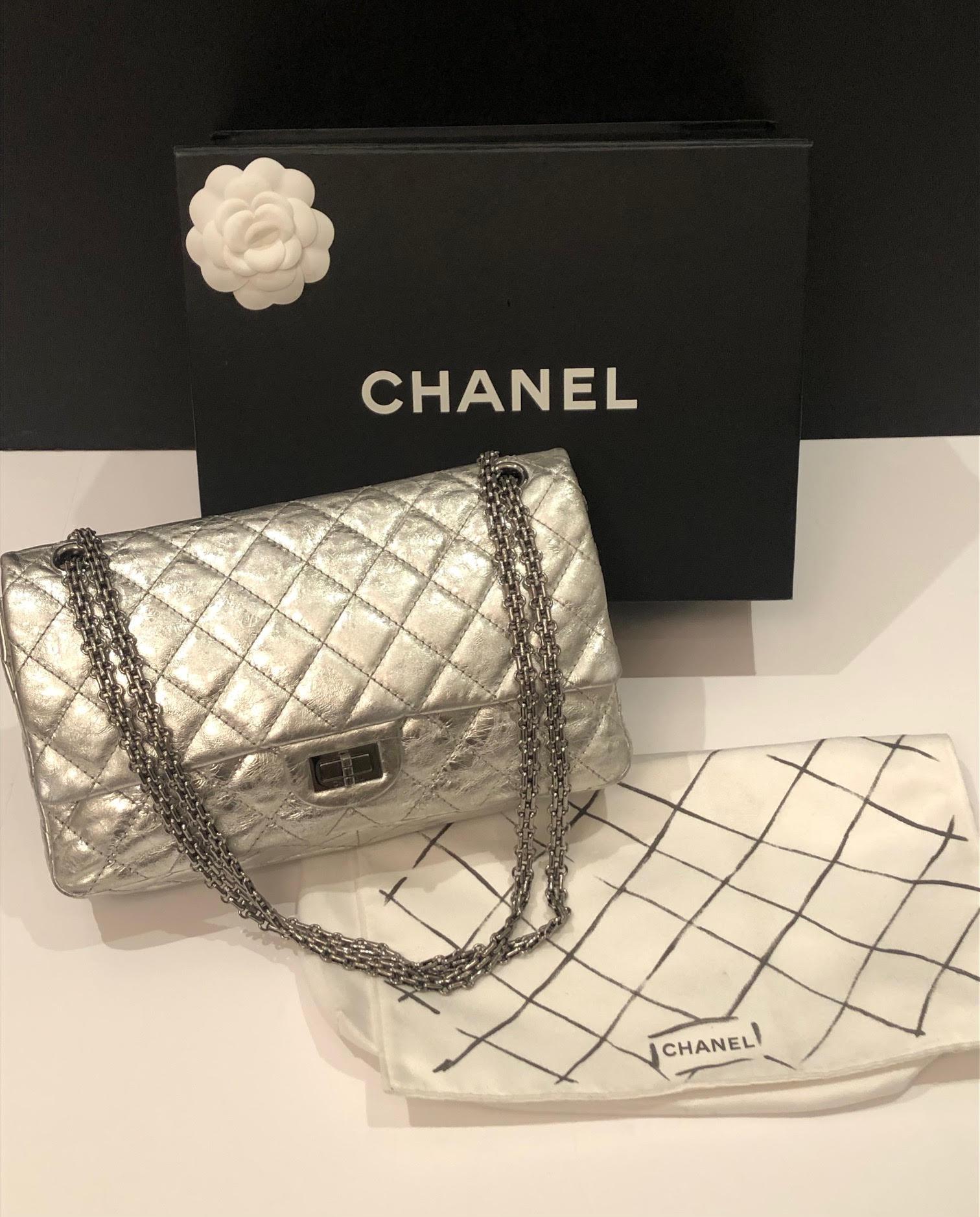 CHANEL Metallic Silver Quilted 2.55 Aged Leather Reissue Double Flap Bag 228 C.2006. A beautiful Chanel metallic silver 2.55 reissue double flap bag in very good condition. It is very spacious double flap and the largest size in the reissue 228 bag