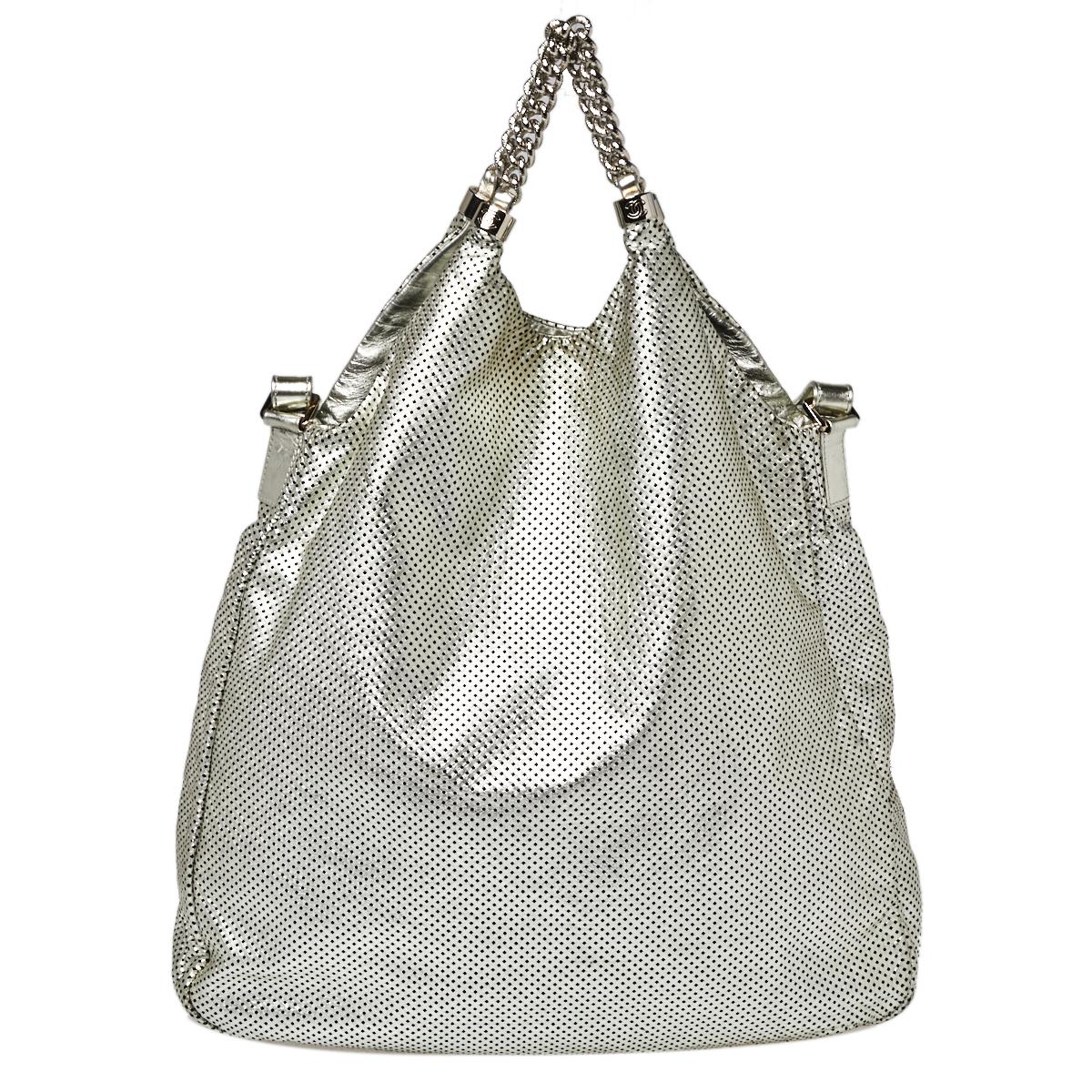 Chanel Metallic Silver Perforated Leather Large Rodeo Drive Hobo In Good Condition In Dubai, Al Qouz 2