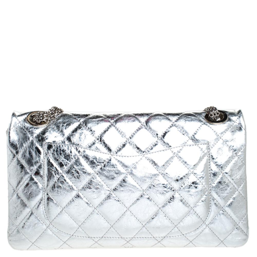 Chanel's Flap Bags are iconic and noteworthy in the history of fashion. This Reissue 2.55 is a buy that is worth every bit of your splurge. Exquisitely crafted from metallic leather, it bears their signature quilt pattern and the iconic Mademoiselle