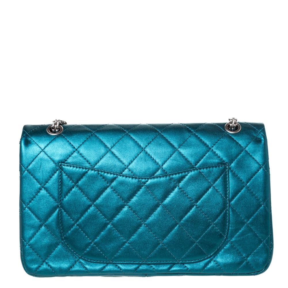 Chanel's Flap Bags are iconic and noteworthy in the history of fashion. Hence, this Reissue 2.55 is a buy that is worth every bit of your splurge. Exquisitely crafted from metallic teal leather, it bears their signature quilt pattern and the iconic