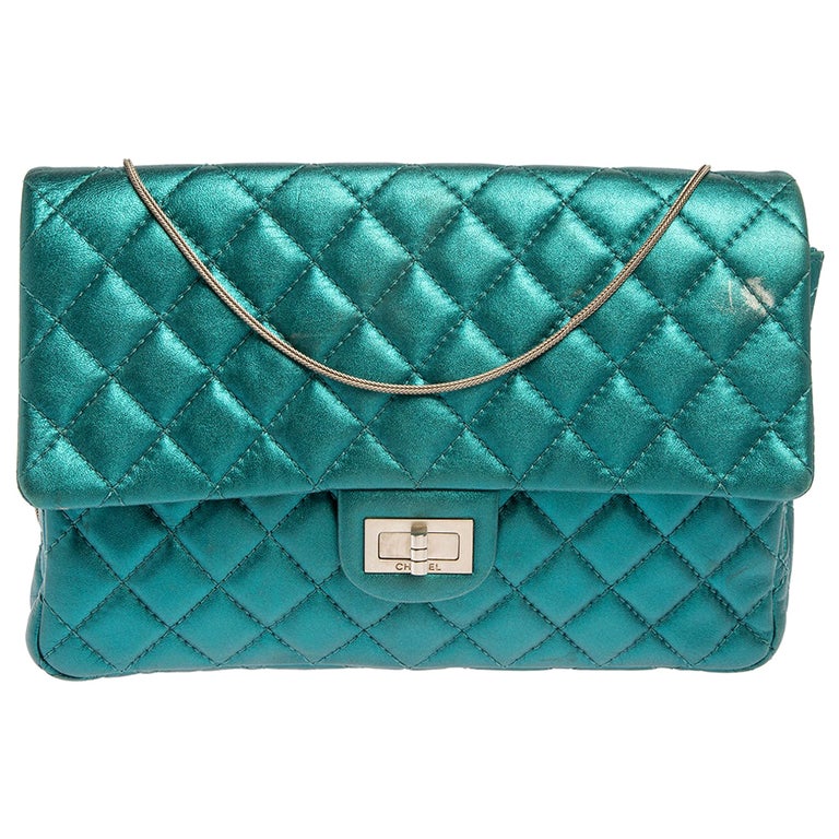 Just bought a 2015 Chanel Turquoise Quilted Patent Leather Reissue