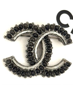 Chanel métiers d’art Paris Dallas Pre Fall 2014 CC logo Brooch