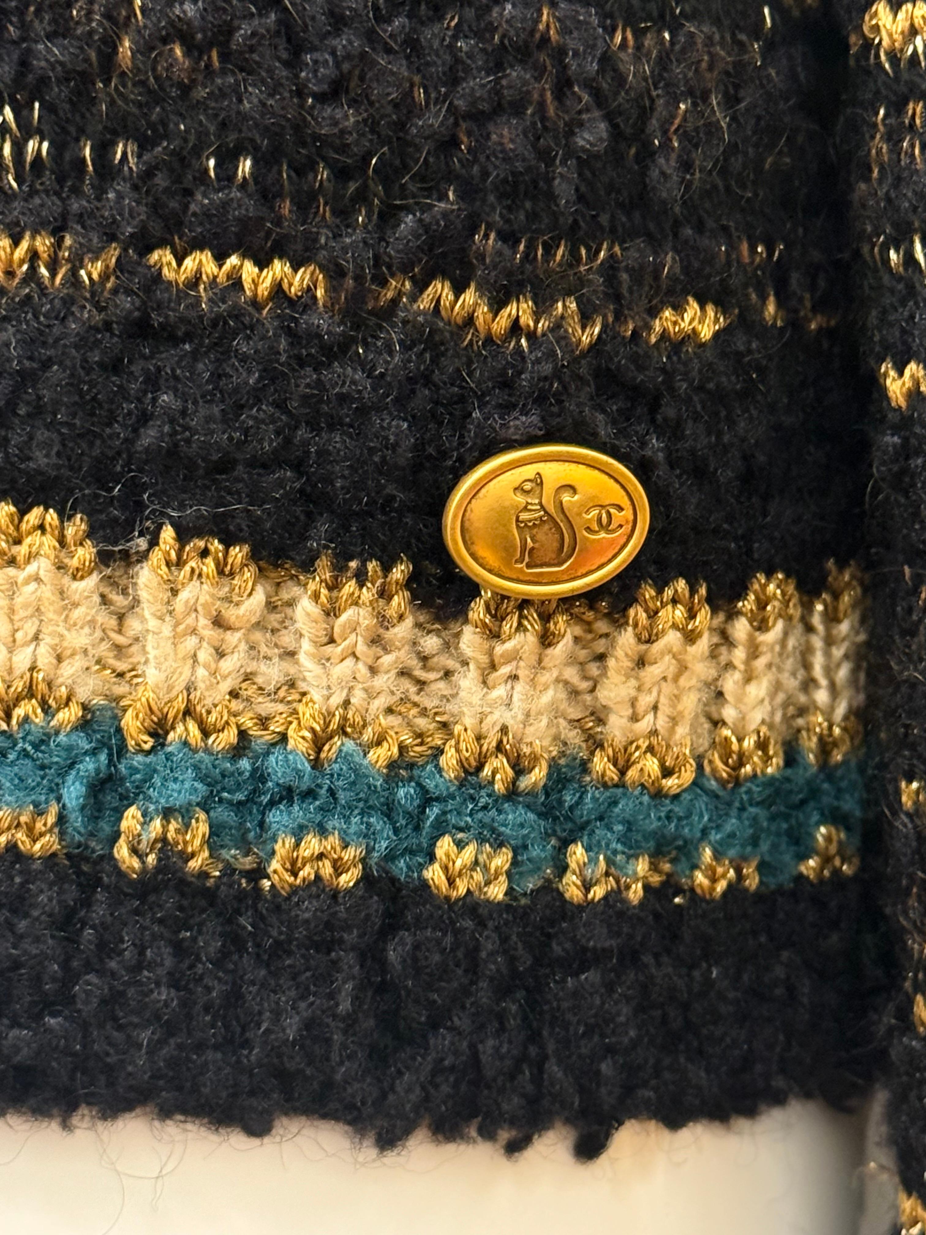 Noir Chanel métiers d'art Paris New York Egyptian collection runway sweater