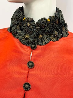 Chanel métiers d’art Paris Shanghai Pre Fall 2010 red silk cape vest by Karl