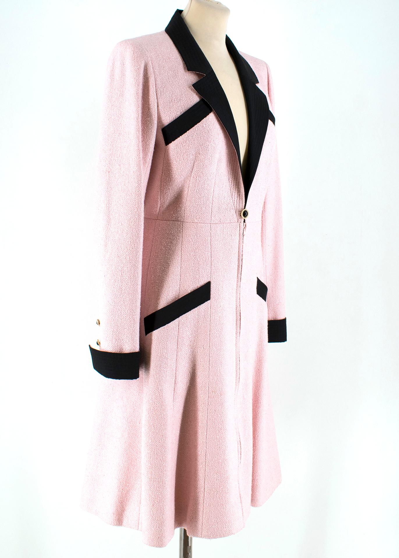 Chanel Milkshake Pink Silk Tweed Coat

- Chanel Spring 2002 Collection 
- Milkshake Pink Coat 
- Single breasted 
- Fully silk lined, Silk tweed 
- Black Notch lapels & cuffs 
- Diagonal slip chest and front hip pockets 
- White beads at closure and