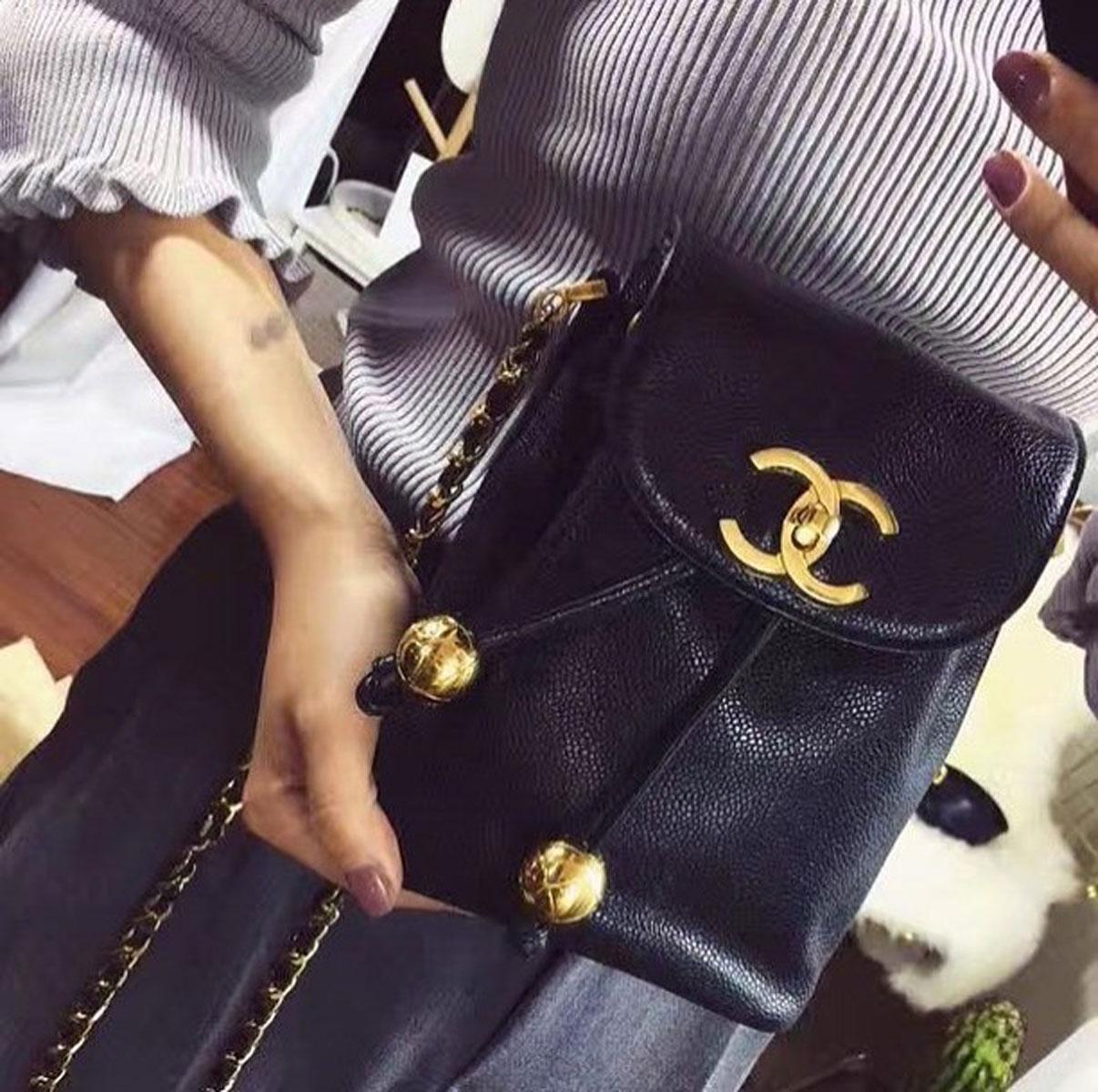 Chanel Mini 1994 Lambskin Rare Vintage Classic Flap Drawstring Crossbody Bag

1994  {VINTAGE 30 Years} 
Gold hardware
Large CC hardware
CC interlocking closure
Interior drawstring closure
Interior attached pouch
Hanging ball hardware detail
Black