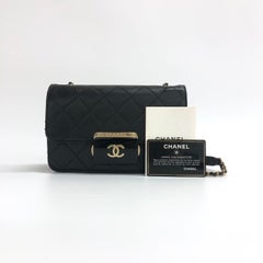 Chanel Mini Beauty Lock Flap Bag Black Lambskin Leather Chain Strap 2017