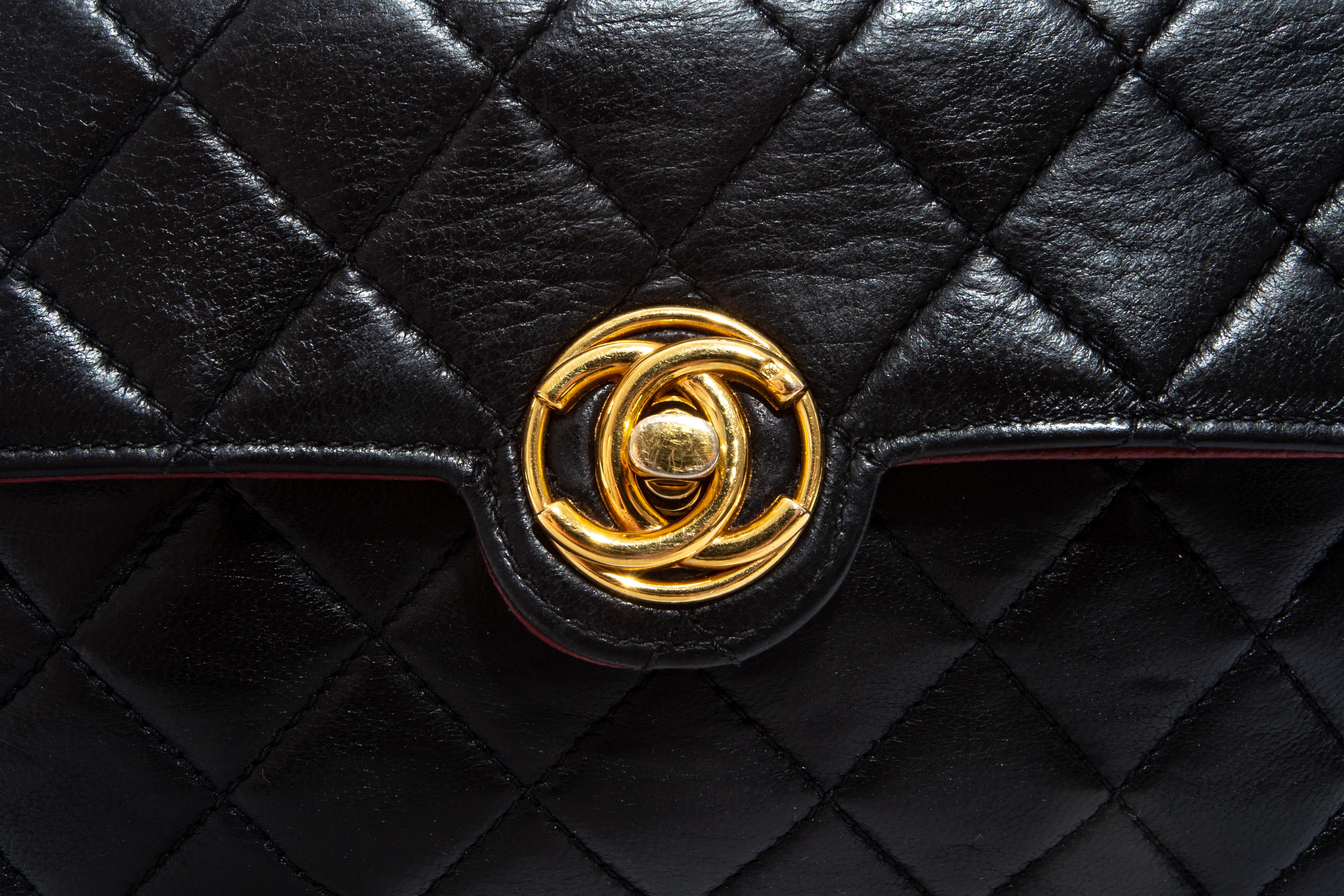 Women's Chanel mini black quilted lambskin leather crossbody flap bag, c. 1986-8