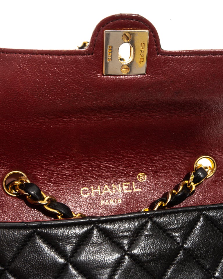 Chanel mini black quilted lambskin leather crossbody flap bag, c. 1986